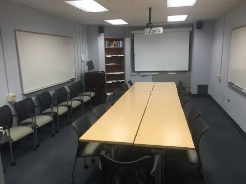 [photo of LRC showing table for work area and projection screen]